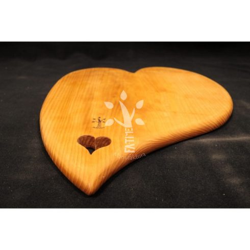 Heart-shaped chopping board made with love 